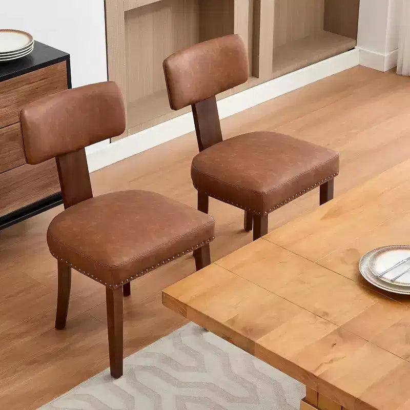 Chaises de salle à manger modernes rembourrées en tissu avec pieds en bois et garniture cloutée