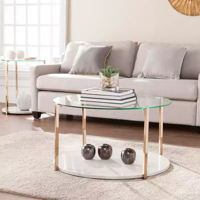 Table basse ronde à plateau en verre et cadre en fer doré