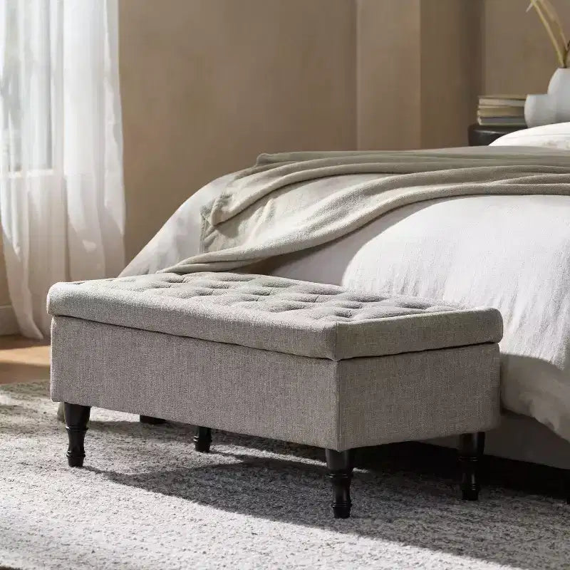 Banc ottoman de rangement capitonné avec pieds en bois tourné