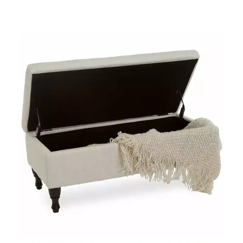 Banc ottoman de rangement capitonné avec pieds en bois tourné