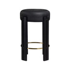Tabouret de comptoir en similicuir végan noir avec repose-pieds en laiton brossé